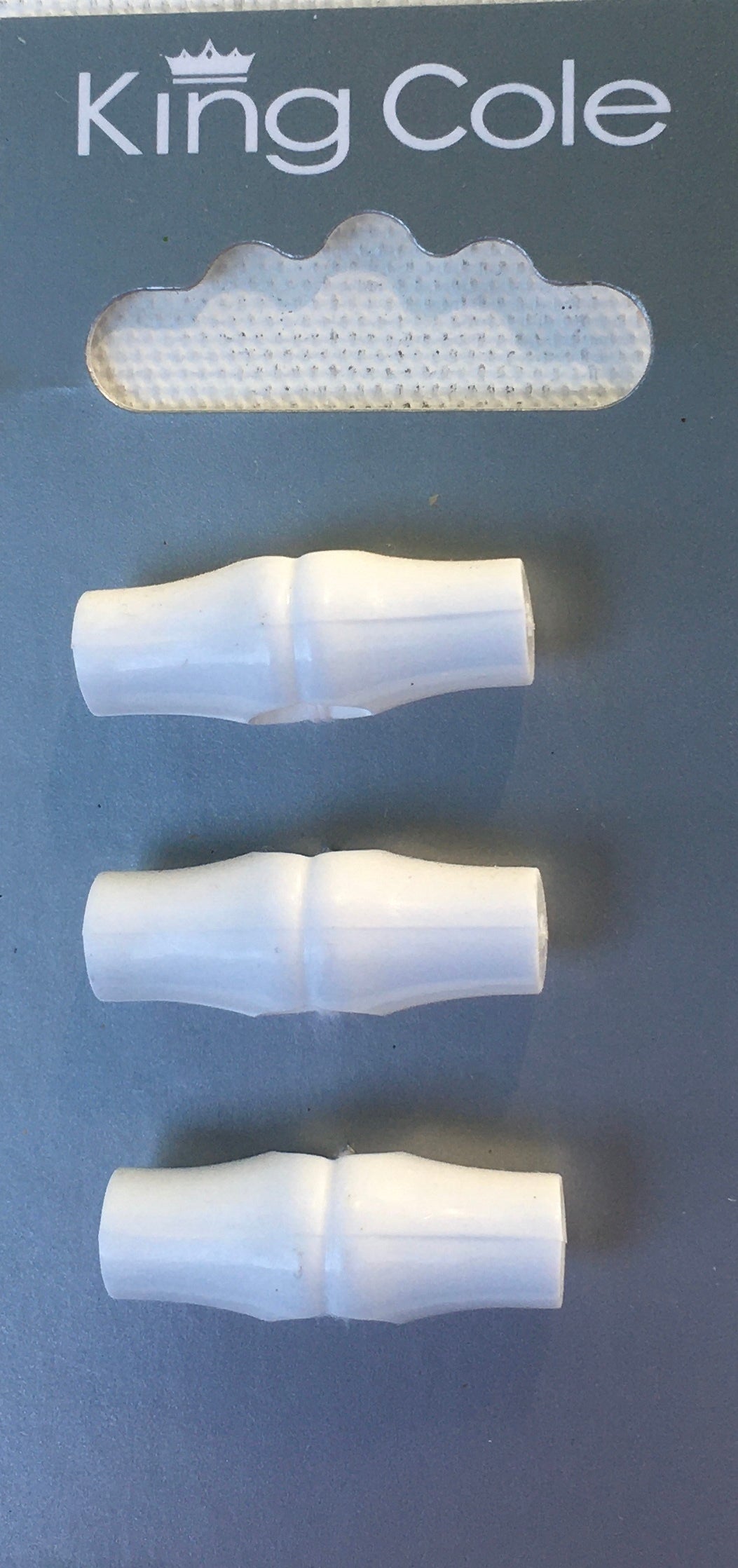 BUT032 Toggles White Medium
